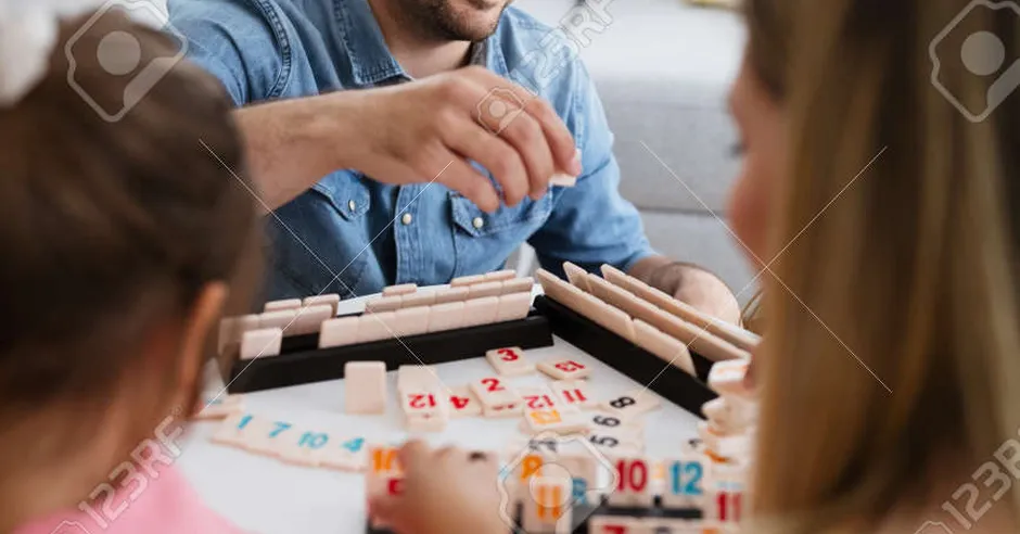 Family playing board games